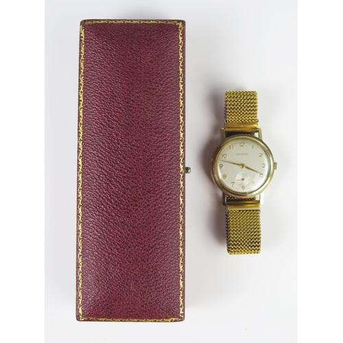 294c - A Gent's GARRARD 9ct Gold Dress Wristwatch in a Dennison Aquatite 34 mm case, back no 349986, manual... 