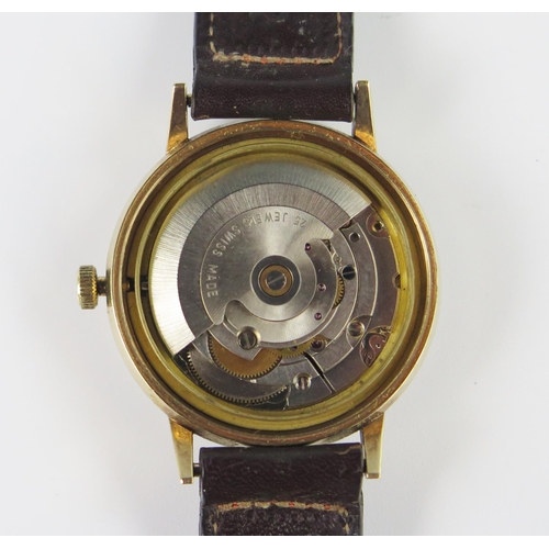 295a - A Gent's J.W. Benson 9ct Gold Automatic Wristwatch, the 34mm case with 25 jewel movement. Running