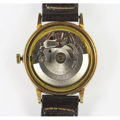 295a - A Gent's J.W. Benson 9ct Gold Automatic Wristwatch, the 34mm case with 25 jewel movement. Running