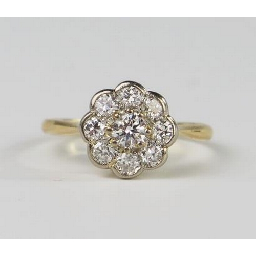 301C - An 18ct Yellow Gold and Diamond Nine Stone Flower Head Cluster Ring, 10.5mm diam. head, size M, 2.3g... 