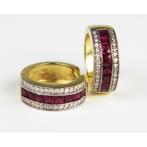 303D - A Pair of 14K Yellow Gold, Channel Set Ruby and Diamond Hoop Earrings, 21.5 mm outer diameter, 18 mm... 