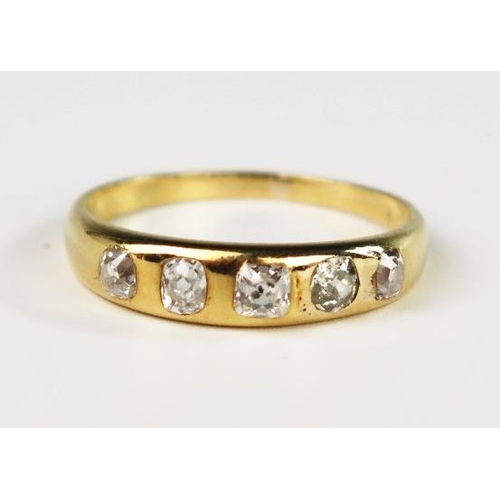 305 - An Unmarked 18ct Yellow Gold and Old Cut Diamond Five Stone Ring in a rub over setting, size Q, 3.5g... 