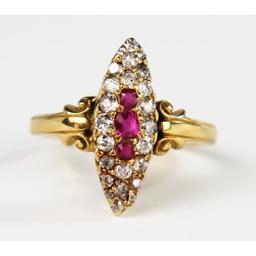 306 - An Antique 18ct Gold, Old Cut Diamond and Ruby Marquis Ring with scrolling decoration to the shoulde... 