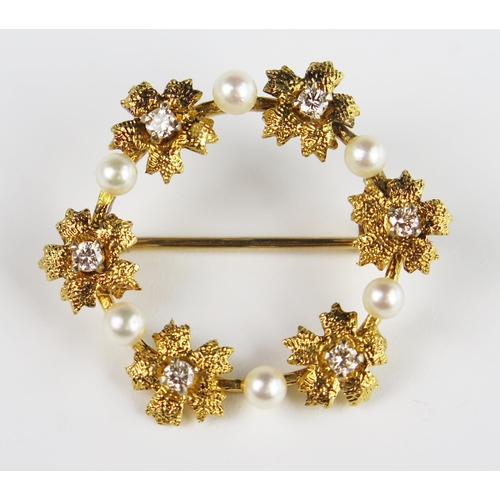 308B - A 9ct Gold, Pearl and Diamond Wreath Brooch, 29 mm diam., 3.4 g

Sold on behalf of the following cha... 