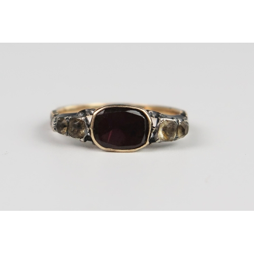 309c - A Georgian Unmarked Gold and Foil Backed Garnet and Paste Ring, size O, 2.2 g