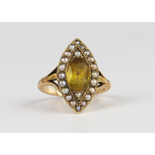 309D - An Antique Foil Backed Paste and Pearl Marquis Shaped Ring in an unmarked gold setting, 20 x 11 mm h... 