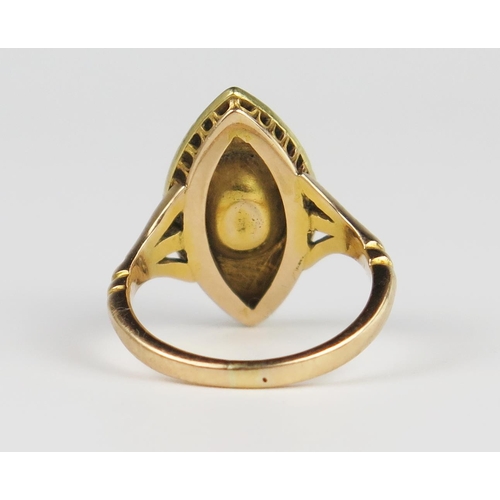 309D - An Antique Foil Backed Paste and Pearl Marquis Shaped Ring in an unmarked gold setting, 20 x 11 mm h... 