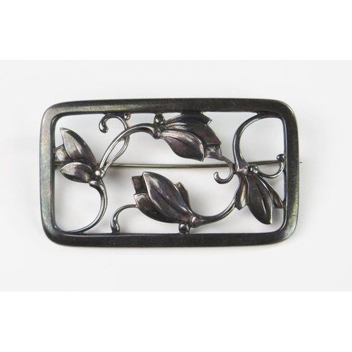 316 - A Georg Jensen Sterling Silver Brooch with scrolling foliate decoration, London 1957 marks, 54 x 31 ... 