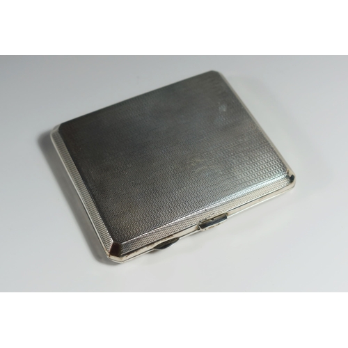 32 - A George VI Silver Cigarette Case with engine turned decoration and contemporary initials, Birmingha... 