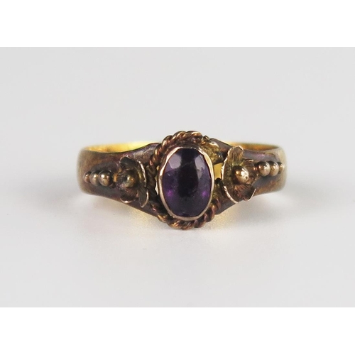 322 - A Pretty Victorian 22ct Gold and Amethyst Ring with flowers to the shoulders, Birmingham 1883, maker... 