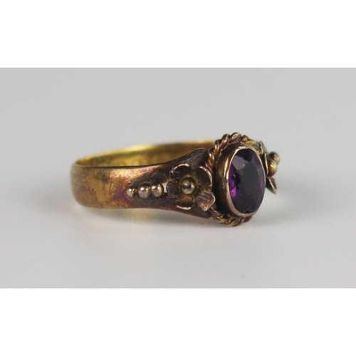 322 - A Pretty Victorian 22ct Gold and Amethyst Ring with flowers to the shoulders, Birmingham 1883, maker... 