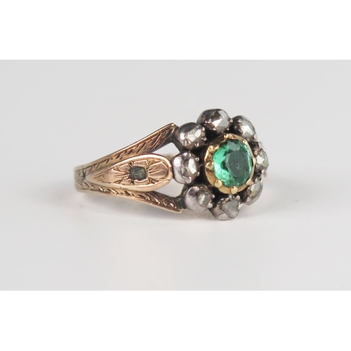 323 - A Georgian Foil Backed Green Paste and Rose Cut Diamond Cluster Ring in a rub over setting, unmarked... 