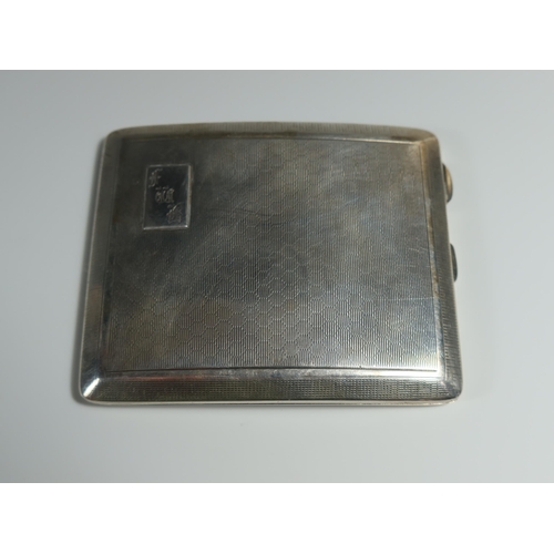 33 - A George V Silver Cigarette Case with engine turned decoration and contemporary initials, Birmingham... 