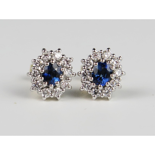 333 - A Pair of Modern 18ct White and Yellow Gold, Sapphire and Diamond Cluster Earrings, sapphires c. 4.8... 