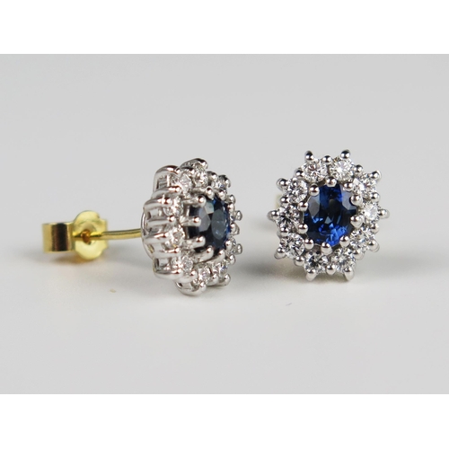 333 - A Pair of Modern 18ct White and Yellow Gold, Sapphire and Diamond Cluster Earrings, sapphires c. 4.8... 