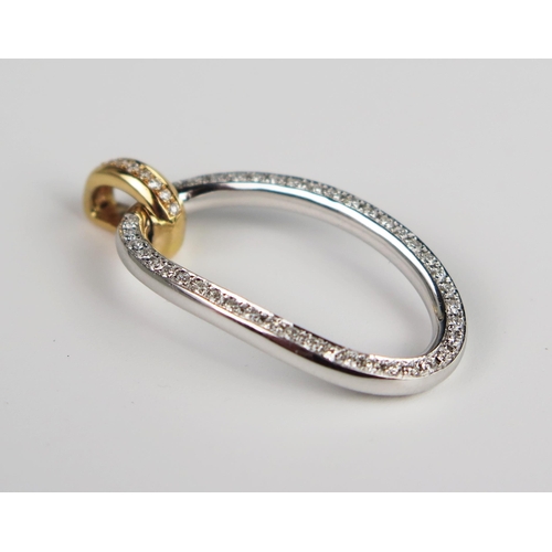 336 - A Hans D. Krieger 18ct Gold Oval Diamond Pendant, the white gold hoop set with 42 x c. 1.5 mm round ... 