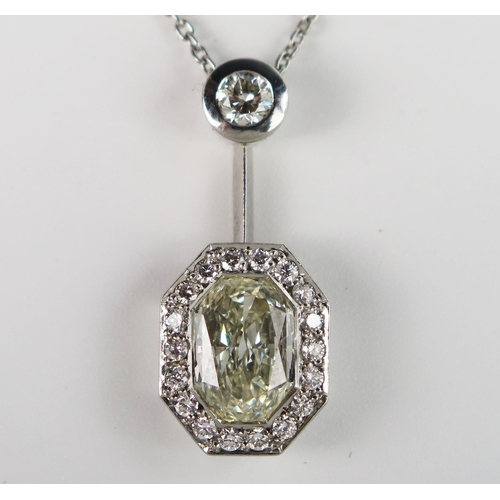 340 - A Modern Platinum and Diamond Pendant Necklace, the central octagonal multi-faceted 2.01ct stone ass... 