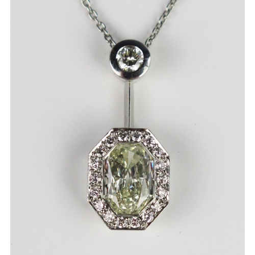 340 - A Modern Platinum and Diamond Pendant Necklace, the central octagonal multi-faceted 2.01ct stone ass... 