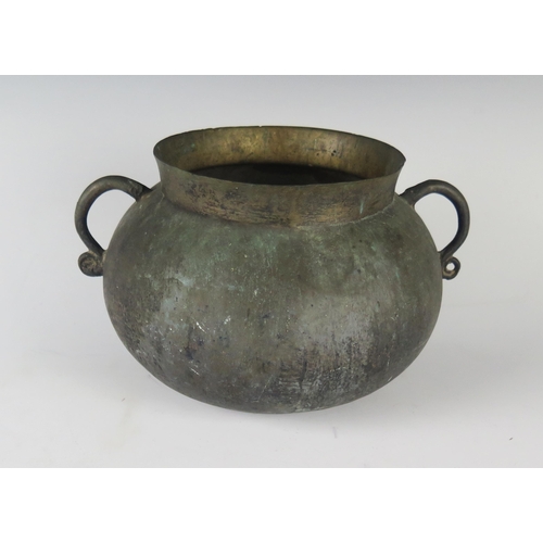 342 - An Antique Asian Bronze Vessel with two scrolling handles, 15.5(h) x 25.5(w) cm