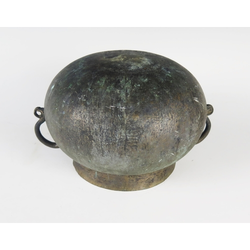 342 - An Antique Asian Bronze Vessel with two scrolling handles, 15.5(h) x 25.5(w) cm