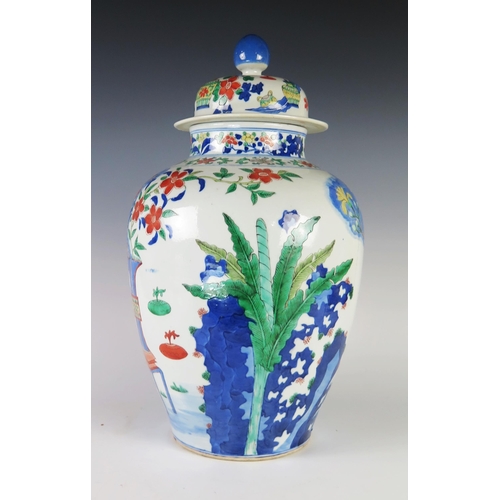 352 - An Antique Chinese Wucai Porcelain Vase with Cover decorated with vases, prunus, ferns and other fol... 