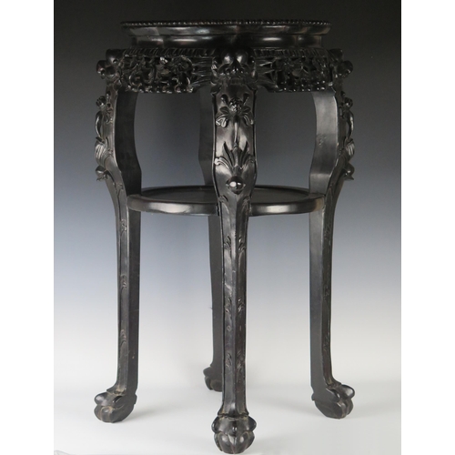 353 - A 19th Century Chinese Carved Rosewood and Marble Top Two Tier Stand with a pierced foliate frieze a... 