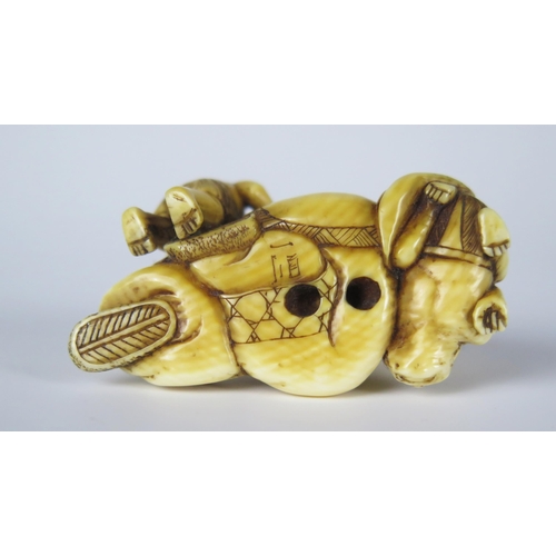 354 - A 19th Century Japanese Ivory Netsuke of a seated man with two devils, signed. **CONTAINS IVORY** UK... 