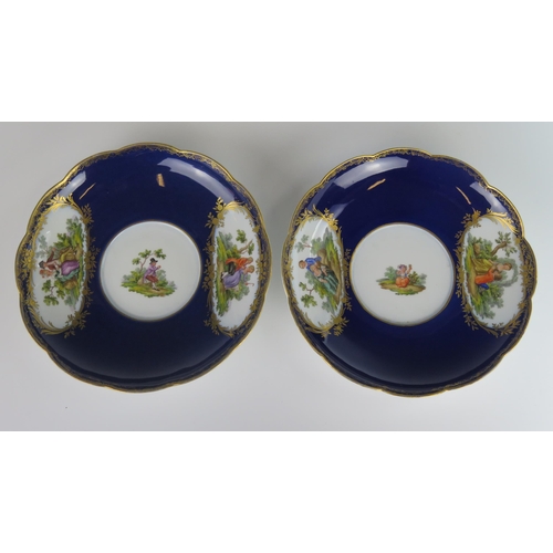 376 - A Pair of 18th Century Meissen Blue Lapis Ground Ecuelles and Covers with Saucers decorated with var... 