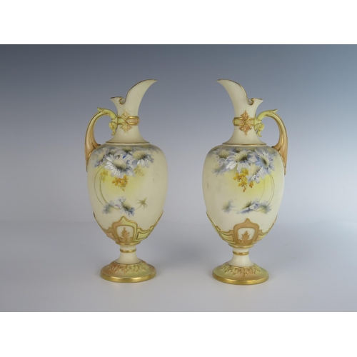 385 - A Pair of Royal Worcester Ivory Ground Floral Decorated Ewers, 1894 model 1581, 20 cm