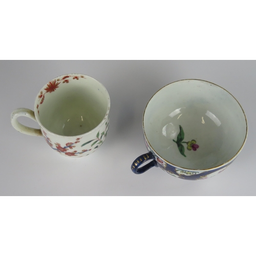 390 - A Dr. Wall First Period Worcester Teacup decorated with flowers on a blue scale ground, underglaze m... 