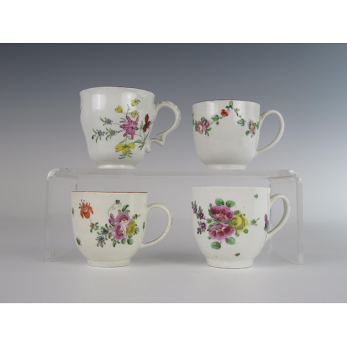 396 - Four 18th Century Bristol Porcelain Cups with hand painted floral decoration, X underglaze mark to b... 