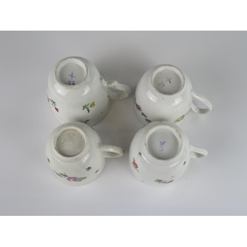 396 - Four 18th Century Bristol Porcelain Cups with hand painted floral decoration, X underglaze mark to b... 