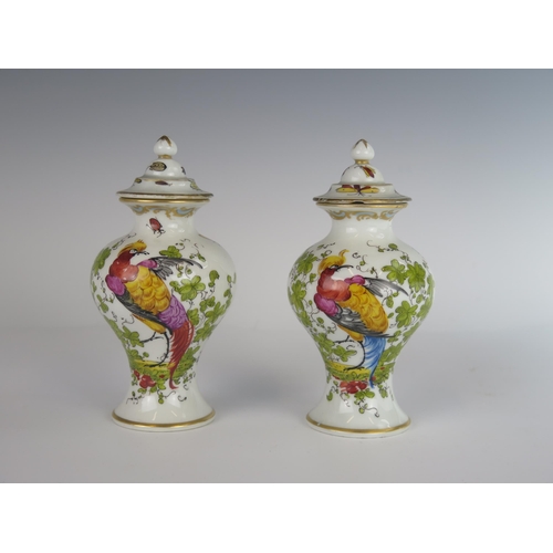 402 - A Pair of 19th Century Porcelain Vases with Covers decorated with pheasants and insects, gold anchor... 