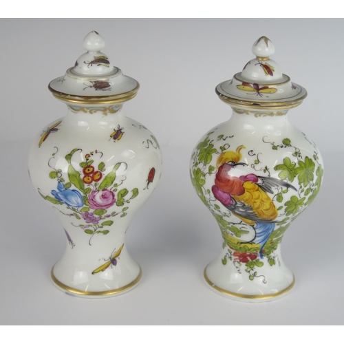 402 - A Pair of 19th Century Porcelain Vases with Covers decorated with pheasants and insects, gold anchor... 