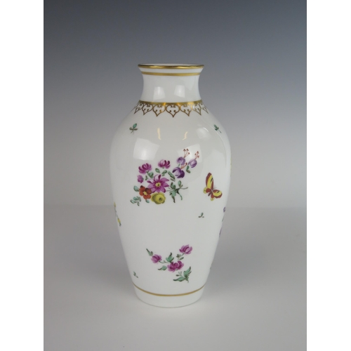 403 - A 19th Century Porcelain Vase decorated with flowers and insects and with gilt, marked NANTGARW, 22.... 