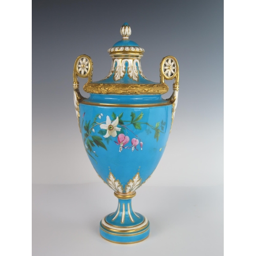 404 - A 19th Century MINTON Porcelain Two Handled Vase with Cover decorated with flowers and berries and w... 