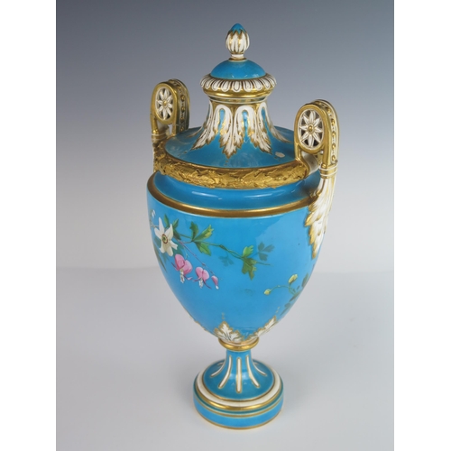 404 - A 19th Century MINTON Porcelain Two Handled Vase with Cover decorated with flowers and berries and w... 