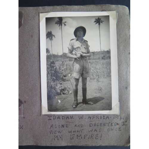 411 - A WWII British Ware Medal (1939-45), Defence Medal and photograph album including Ibadan W. Africa