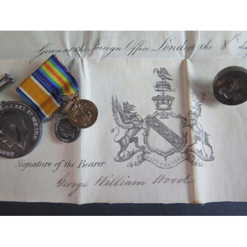 412 - A WWI Medal Pair awarded to CAPT. A.E. WOOD. with original cardboard box and dress miniatures, two p... 