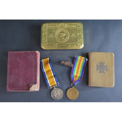 415 - A WWI Two Medal Group awarded to 45440 PTE. G. NOON. H.L.I., a Christmas 1914 tin with piece of shel... 