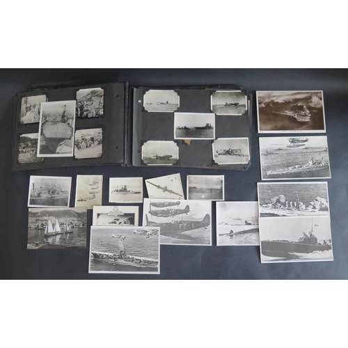 417 - A WWII Navy Photograph Album including Gibraltar with numerous scenes of engagement, including Aircr... 