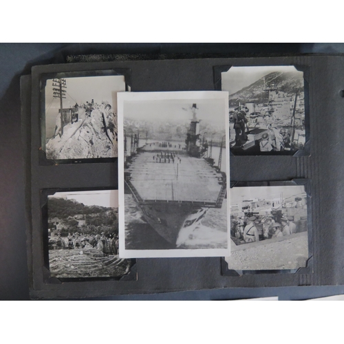 417 - A WWII Navy Photograph Album including Gibraltar with numerous scenes of engagement, including Aircr... 