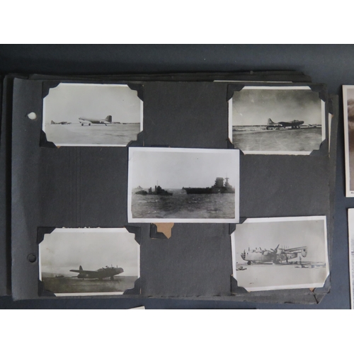 417 - A WWII Navy Photograph Album including Gibraltar with numerous scenes of engagement, including Aircr... 