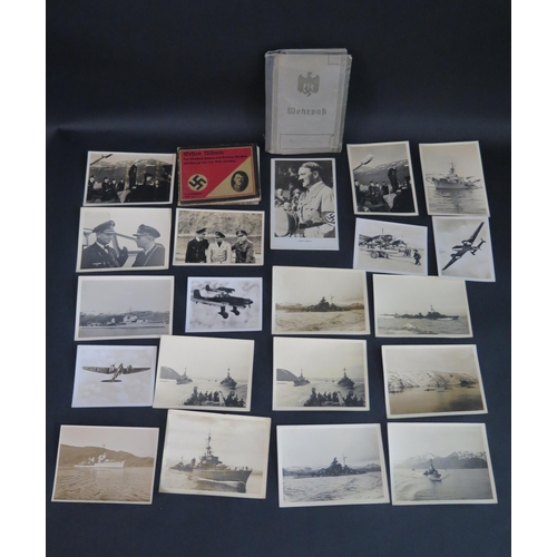 431 - A WWII German Passbook Sleeve containing a postcard of Adolf Hitler Kriegsmarine photographs of offi... 