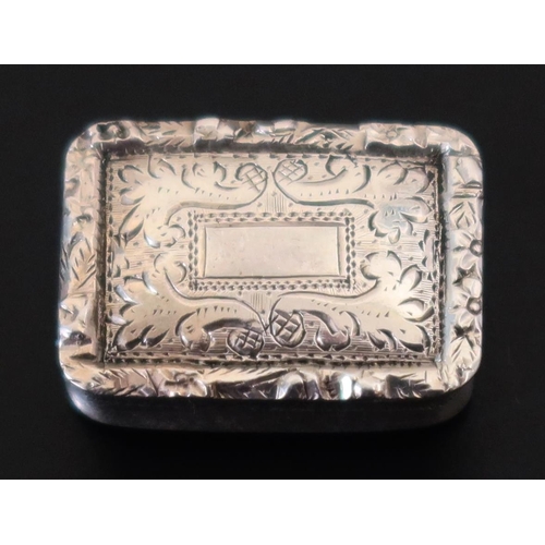 6 - A William IV Silver Vinaigrette with chased foliate decoration and gilt grill, Birmingham 1834, Nath... 