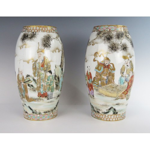 358 - A Pair of Early 20th Century Japanese Export Seto Porcelain Vases continuously decorated with figure... 