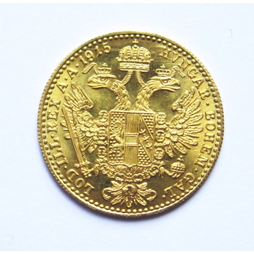 214 - An Austrian 1915 1 DUCAT Gold Coin, nearly uncirculated, c. 3.5g