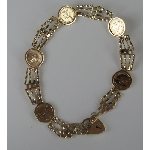 7 - A 9ct Gold Miniature Coin Set Gate Link Bracelet, 8g