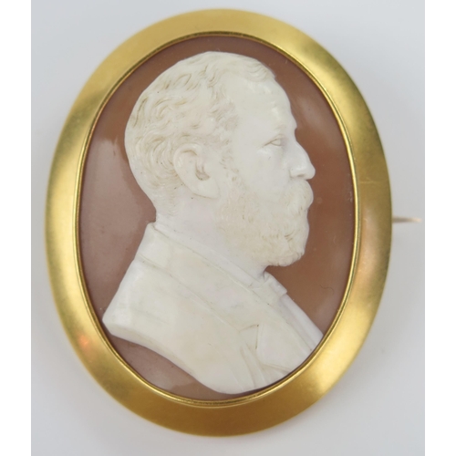 13 - Large Victorian Shell Cameo Brooch decorated with a high relief bust of a gentleman and in a heavy u... 
