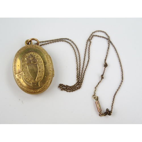 156 - Victorian Unmarked Gold Locket decorated with relief leaf design and chased foliate work (39mm drop,... 